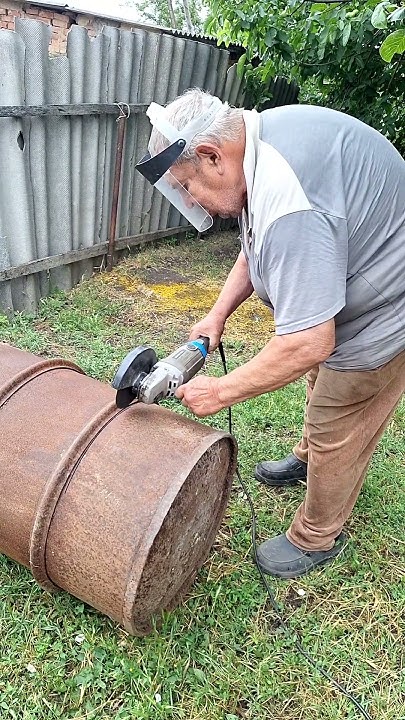 Ukrainian Grandpa Petrovych Cutting a Barrel with a Grinder #shorts # ...