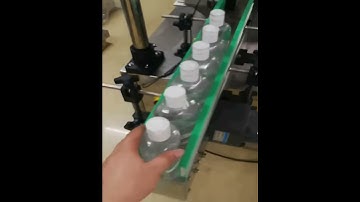 Automatic pick and place rotary roller wheel capping machine