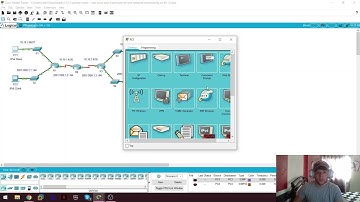 13.2.7 Packet Tracer - Utilice Ping y Traceroute para probar la conectividad de red