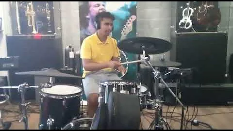 Playing on Electric Drums  with Headphones  on at ...
