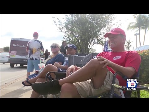 Trump supporters line up ahead of departure for New York to face charges