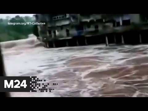 В Китае из-за мощных ливней ушла под воду целая провинция - Москва 24