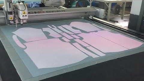 Material: BK2 cooperates with projector to cut textile and garment