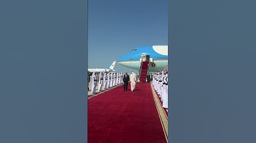President Donald Trump is greeted by the Emir of Qatar