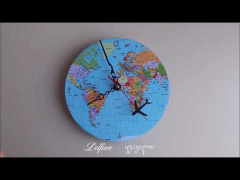 საათი მსოფლიოს რუკის გამოსახულებითა და მბრუნავი თვითმფრინავით