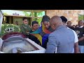 MURDERED PHARMACIST LAID TO REST