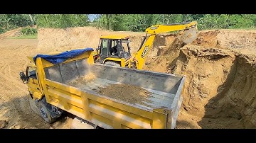 Jcb Backhoe machine loading soil in Heavy Truck @roadtrendmachinework