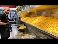 مطعم مخفي في باريس مطعم همبرغر للوجبات السريعة يشتهر بالبطاطس البلجيكية طعام الشارع الفرنسي مطعم مخفي في باريس مطعم همبرغر للوجبات السريعة يشتهر بالبطاطس البلجيكية طعام الشارع الفرنسي