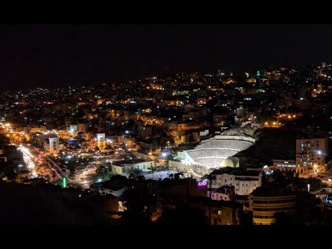 أرخت عمان جدائلها   