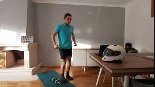 Lateral Jumps over Dumbbell