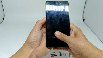 Como colocar o chip no celular Quantum L?