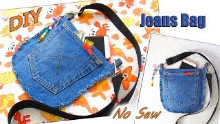 Best out of waste! this cute boho style denim bag is made from old
jeans in 5 minutes. video i will show you #diy how to make fashion
small clutch pu...