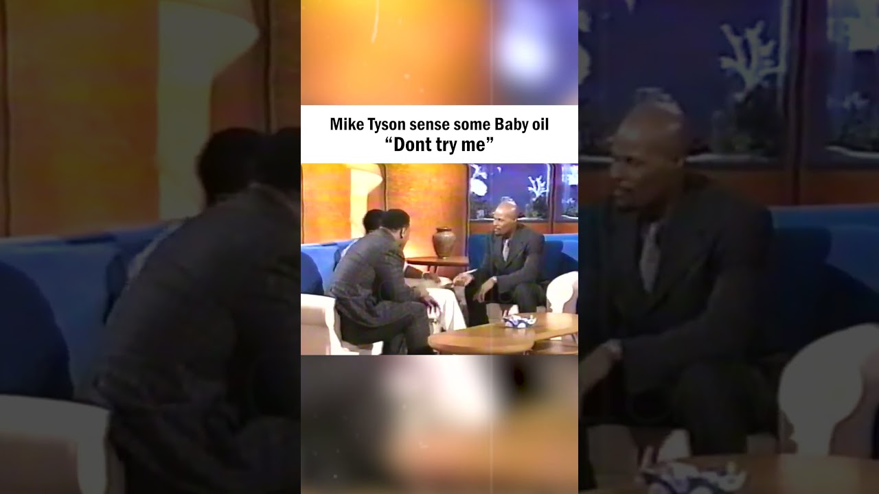 Майк Тайсон отталкивает руку Дидди от своей ноги — шоу Кинана Айвори Уэйанса 1998 года