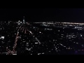 New york city by night at the top of the empire state building