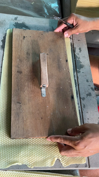 Cutting beeswax make new beehives frame #farmer #beehive #insects #bee #beefeater #animals