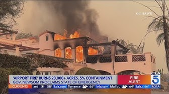 Airport Fire slows overnight but still threatening homes thumbnail