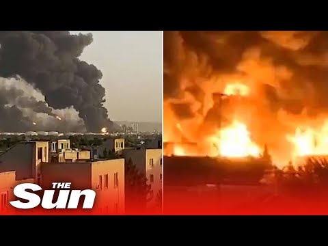 Explosion cripples Iran oil refinery hours after fire sinks its largest warship.