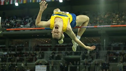 Stefan Holm high jump 59 cm above head.  (World re...