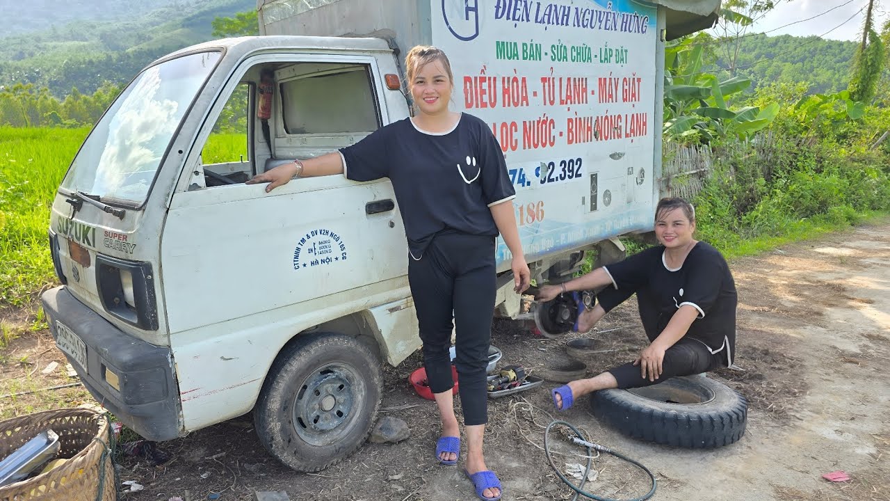 The girl repaired and maintained the entire engine of the old truck.