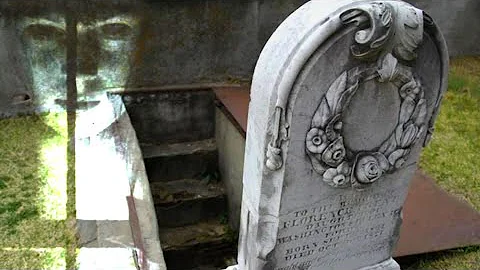 They put in a window to see inside her grave