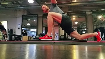 Spiderman stretch with t-spine rotation
