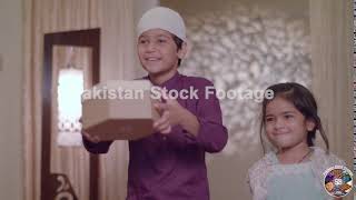 Cute Muslim Children come running to give surprise gifts to their parents on Eid Holiday