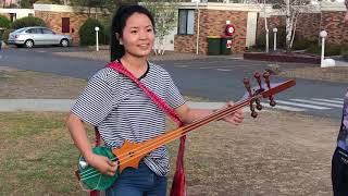 Miniatura de vídeo de "Tenzin Yeshe teaches Tibetan Danyan guitar. Player Kalsang Dolkar and Tsomo 🌏ZaSer Rigsang VP91"