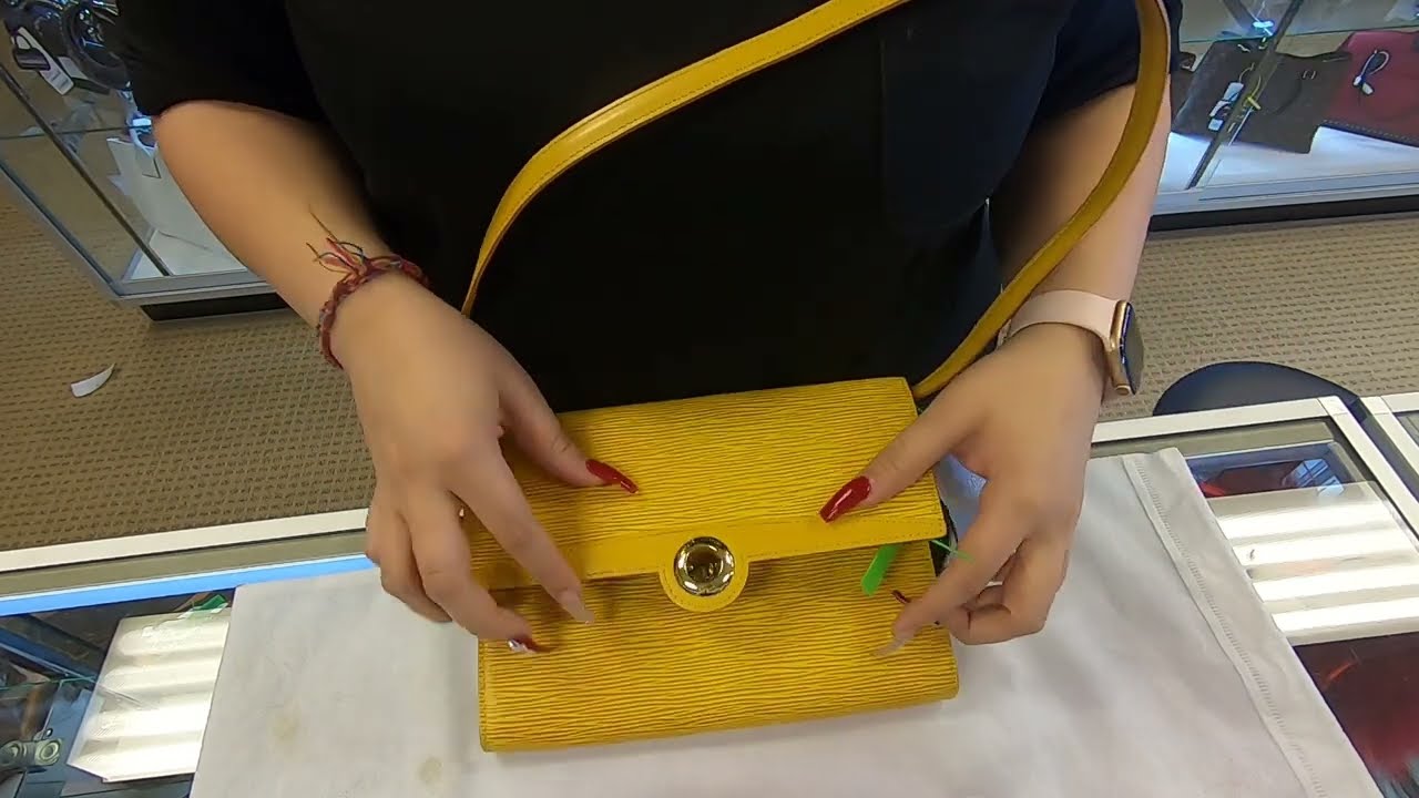 LOUIS VUITTON Arche Pochette Epi Leather Shoulder Bag review | Dallas  designer handbags - YouTube