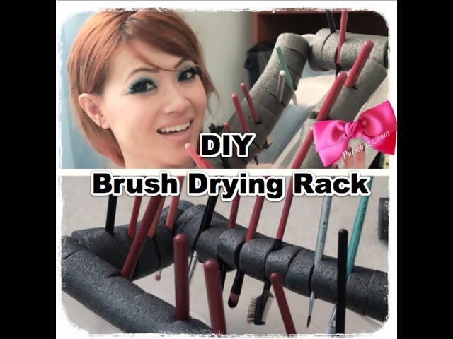 DIY brush holder using a dish drying rack and hair bands. This is a  substitution for the Geneva brush holder. It does the trick. It holds so  many brushes. You guys need