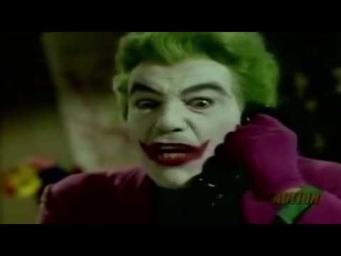 Batman pounds the Joker