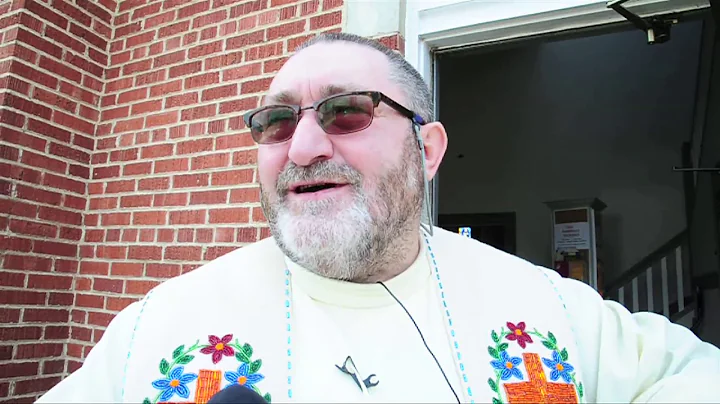 St.Paul priest carries pain through mass