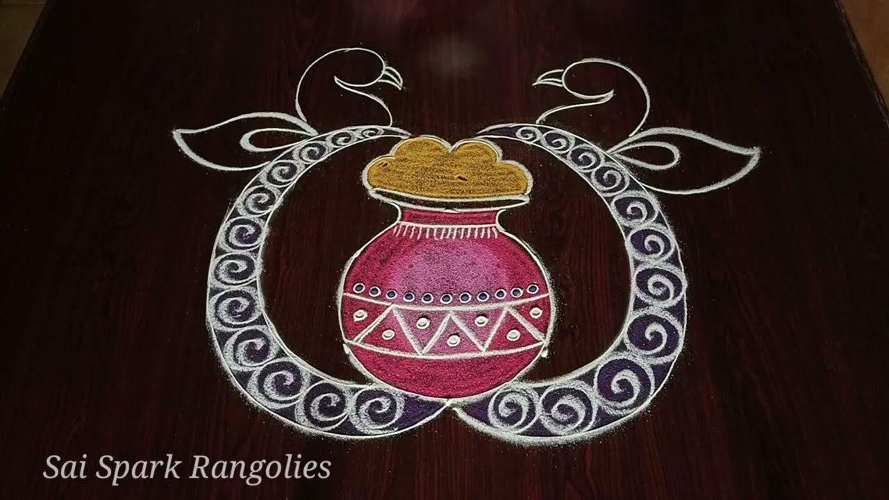 Pongal pot with peacock rangoli / pongal paanai kolam / pongal festival kolangal 