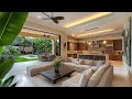 Open Concept Luxury Living Room with Panoramic Greenery and Tropical Garden Integration