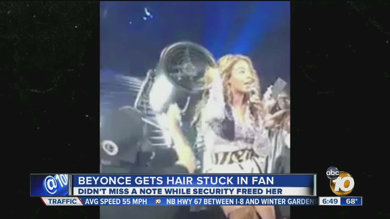 Beyonce's hair gets stuck in fan during concert - YouTube