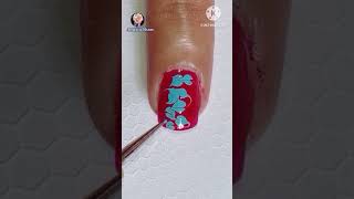 Pastel blue on red polish drag marble nail art design #nailsbyamrita #easynailart #Shorts