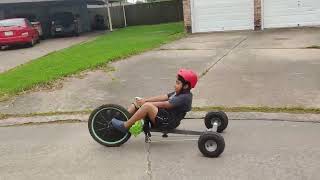 Huffy green machine custom trike with lawn mower tubeless tires.
