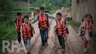 为什么中国乡村儿童上学之路如此艰难？| 十万个为什么
