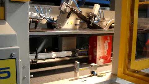 Automatic handle applicator for carton box
