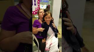 Charlene getting her ears pierced at the Santa Rosa Mall in Pensacola