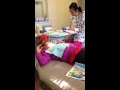 Yana pulling her baby tooth