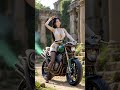 Glamorous Woman Next to a Medusa-Inspired Motorcycle