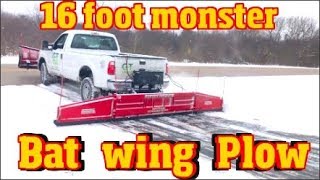 Video still for The fastest Snow plow ever made -16' Monster back plow Finishes a driveway in seconds Bat Wing Plow