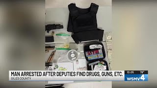 Man arrested after deputies find drugs, guns, etc.