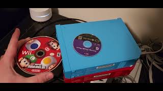 What happens if you put a GameCube disc in a Family Edition Wii (RVL-101) with swapped motherboard?