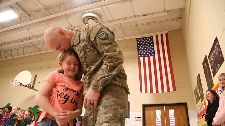 Staff Sgt. Michael Probst surprises his kids at sc...