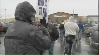 Protestors march outside local Walmart