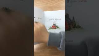 The Little Green Island with A Red House Read by a Child -1