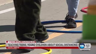 Utah School Uses Hula Hoops To Teach Kids, Parents About Social Distancing