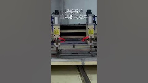 Portable spot welding machine with tables, two welding heads