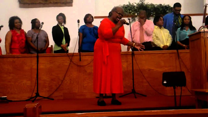 Ado singing "God Specializes" lead Sis. Pearlie Hope